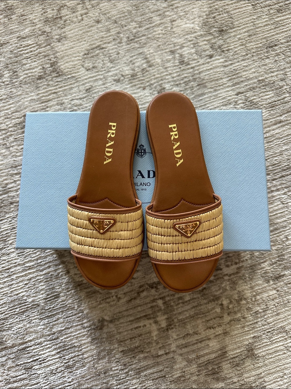 Prada leather and crotchet slides